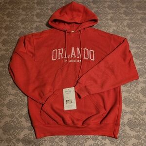 NWT Orlando Perfect Hoodie Pacific & Co from the Disney Store. Diva Coral